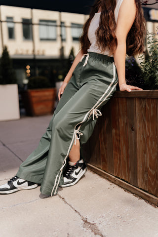 The Ivy Side Bow Track Pant in Emerald
